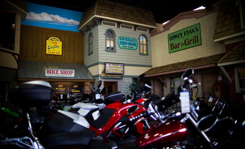 Mountain Motorsports - Sevierville | Motorcycles Front Of A Town Stores Scenography
